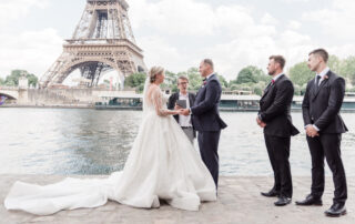 Ceremony in front of the Tower close to the river, the couple and best man and friend
