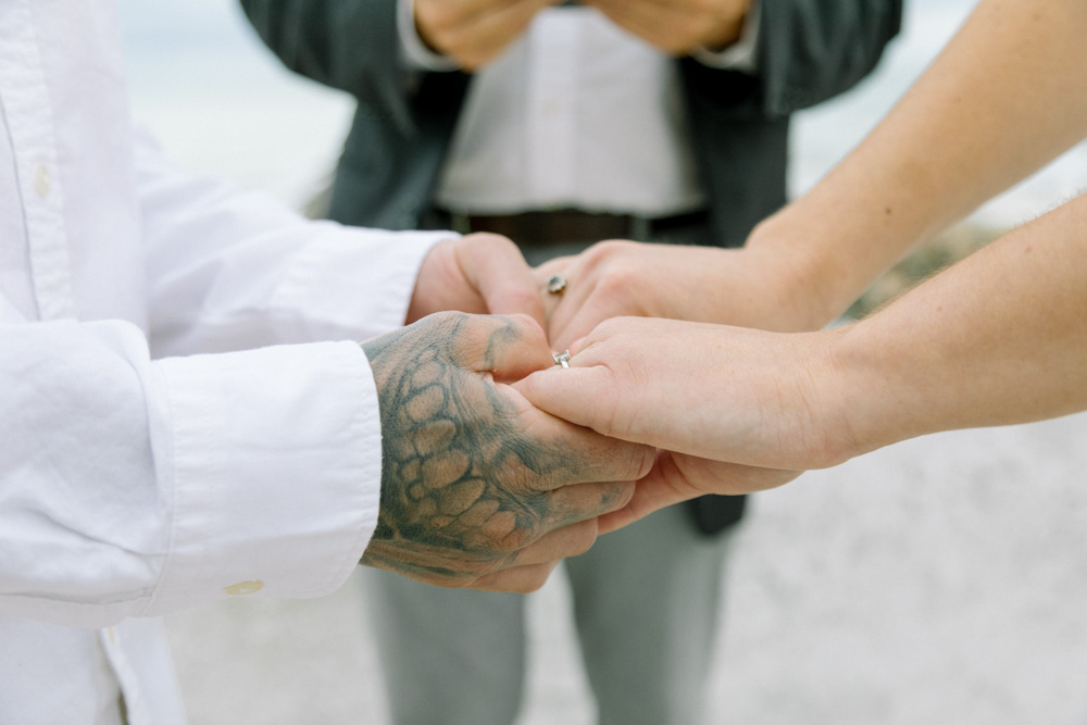 During the vows, the couple hold their hands and look to each other