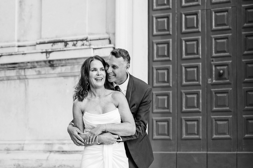 a black and white picture when the couple is laughing in the Positano village