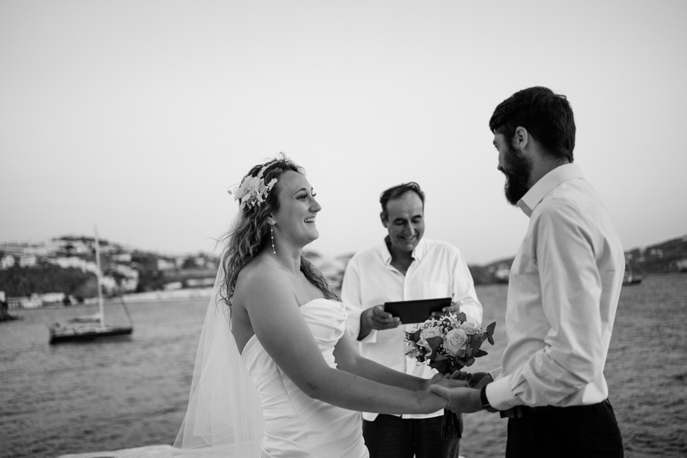 A bland white photo to make this moment of emotion during their elopement ceremony without date