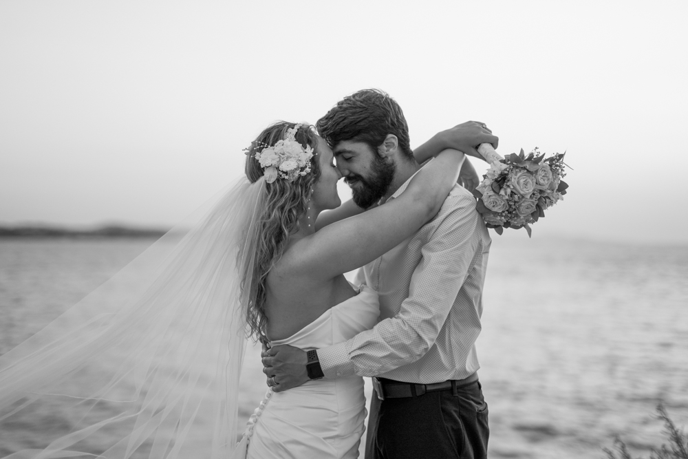 forehead against forehead after their ceremony for a moment of gathering