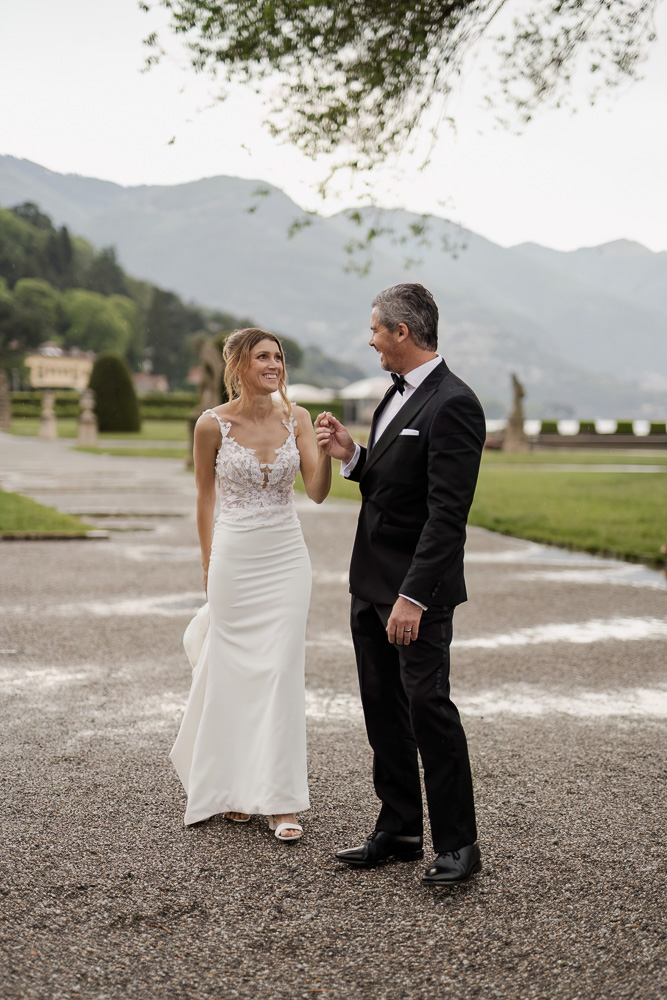 The brides have a drink of champagne