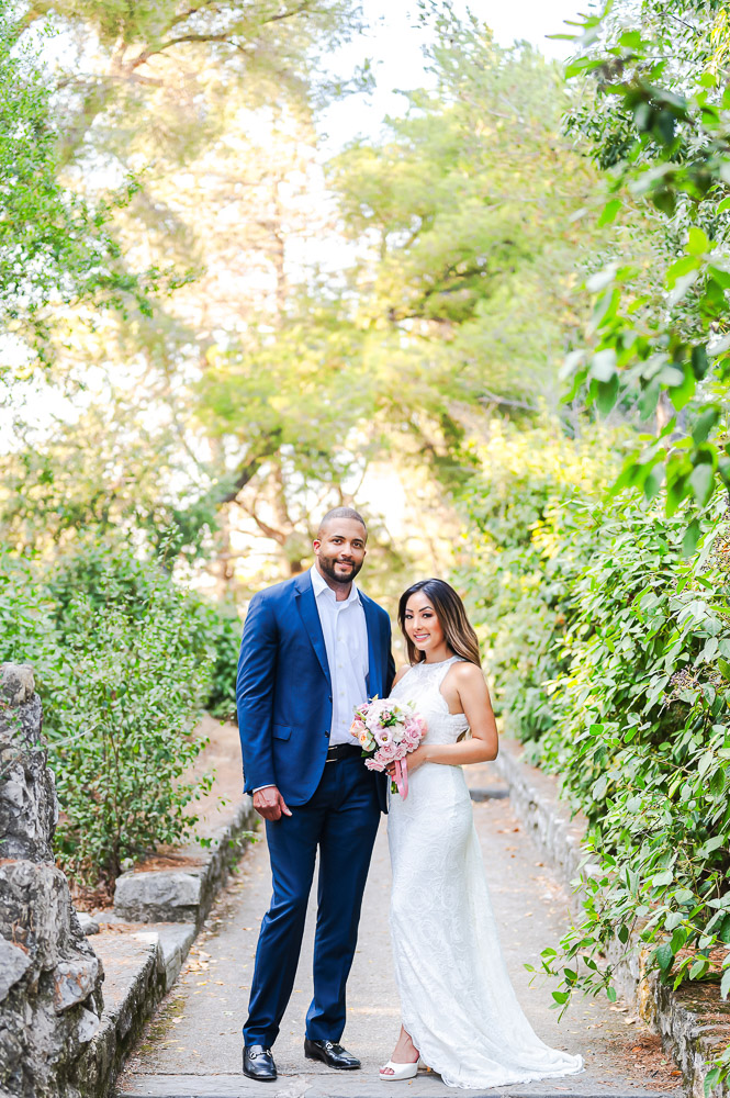 the bride wear a beautiful dress a bit luxury when the groom is chic but relax blue suit