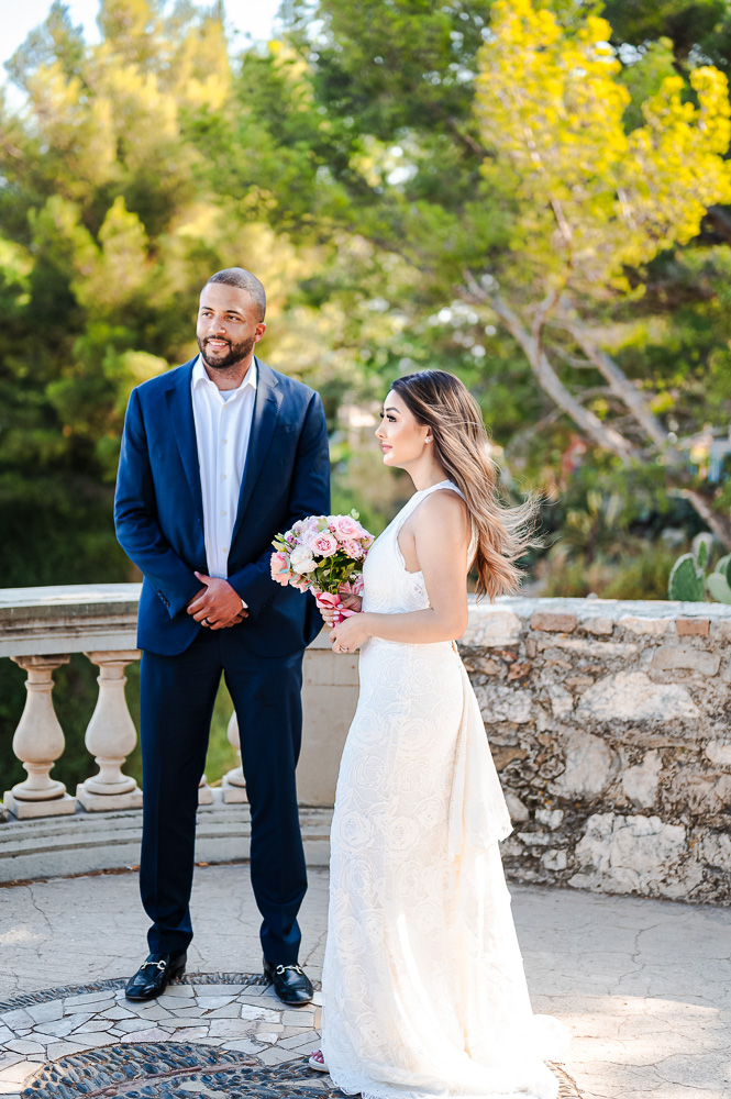 The couple listen carefully to the celebrant