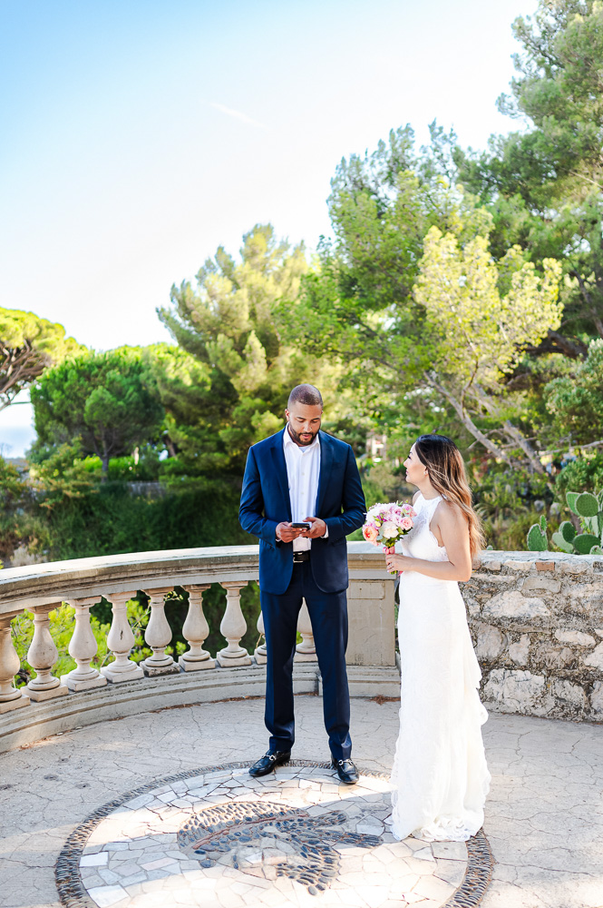 the couple resays their vows to each other The bride listent to her husband