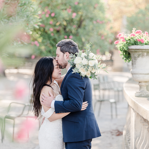 The couple kissing at Luxembourg garden