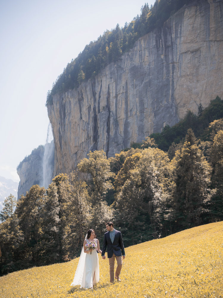 The couple in a valley at Lauterbrunnen village in Switzerland