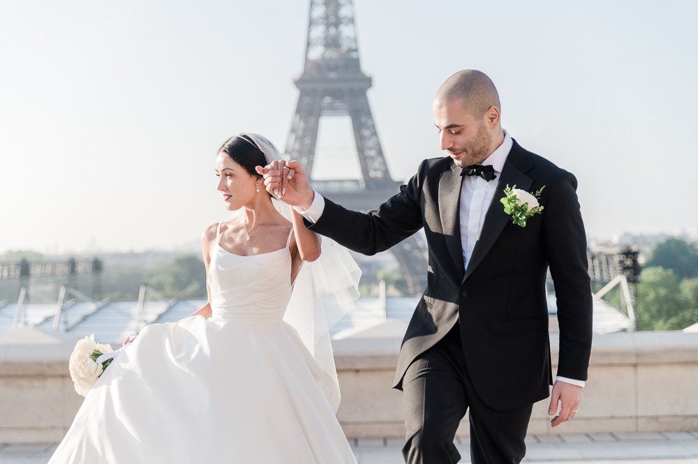 The couple walk hand to hand