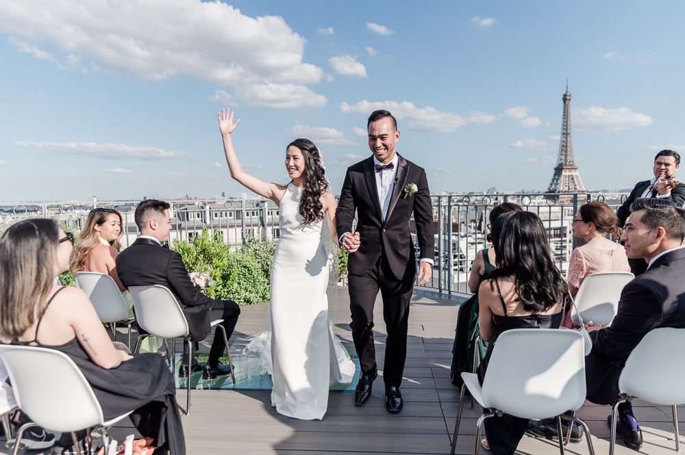 the exit of the ceremony, the couple walk to the exit