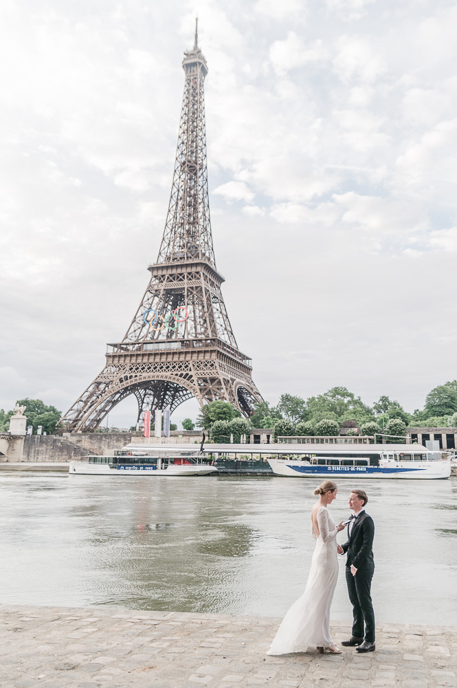 The eiffel tower is the back drop of the current elopement ceremony nearby th eriver