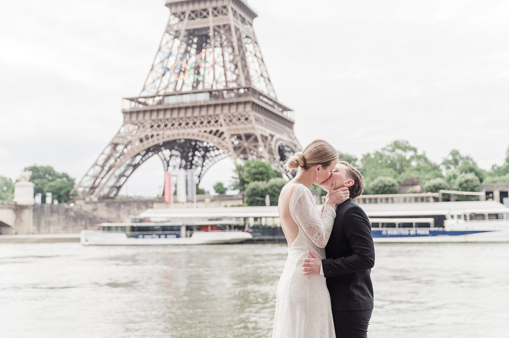 The 2 brides kiss for the end of the ceremony in Paris