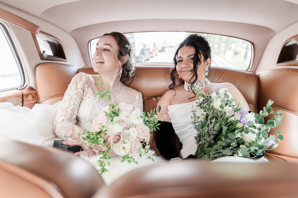 The brides goes by a vintage rolls to the location for the ceremony