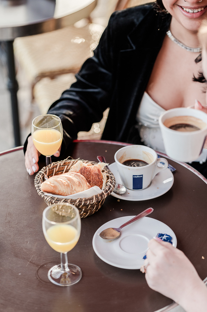 Coffee, croissant, orange juice the detail sof a parisian 