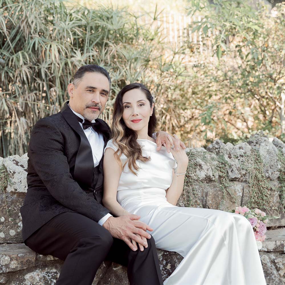 The couple posing after their renew of vows in a garden in Florence